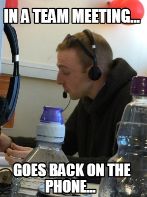 in-a-team-meeting...-goes-back-on-the-phone