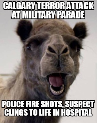 calgary-terror-attack-at-military-parade-police-fire-shots-suspect-clings-to-lif