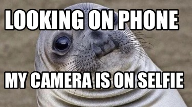 looking-on-phone-my-camera-is-on-selfie